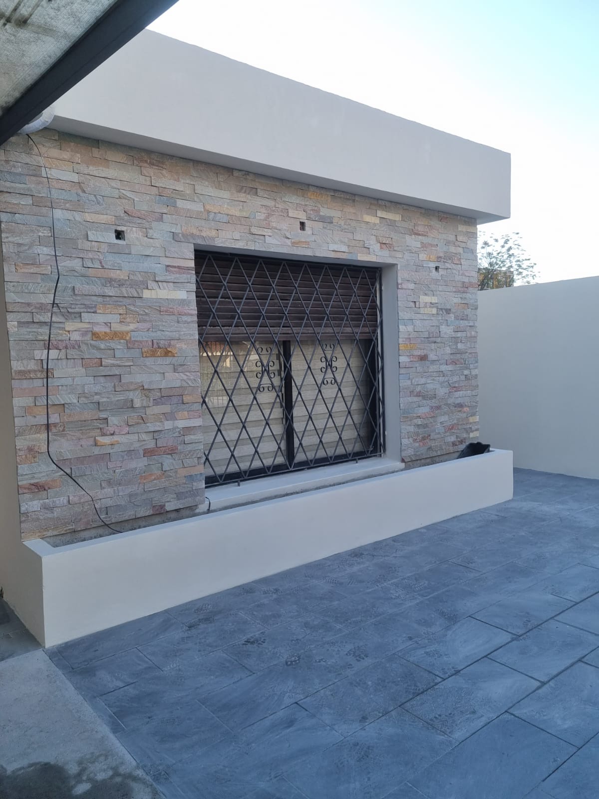 GM CONSTRUCCIONES Despues de fachada en vivienda 