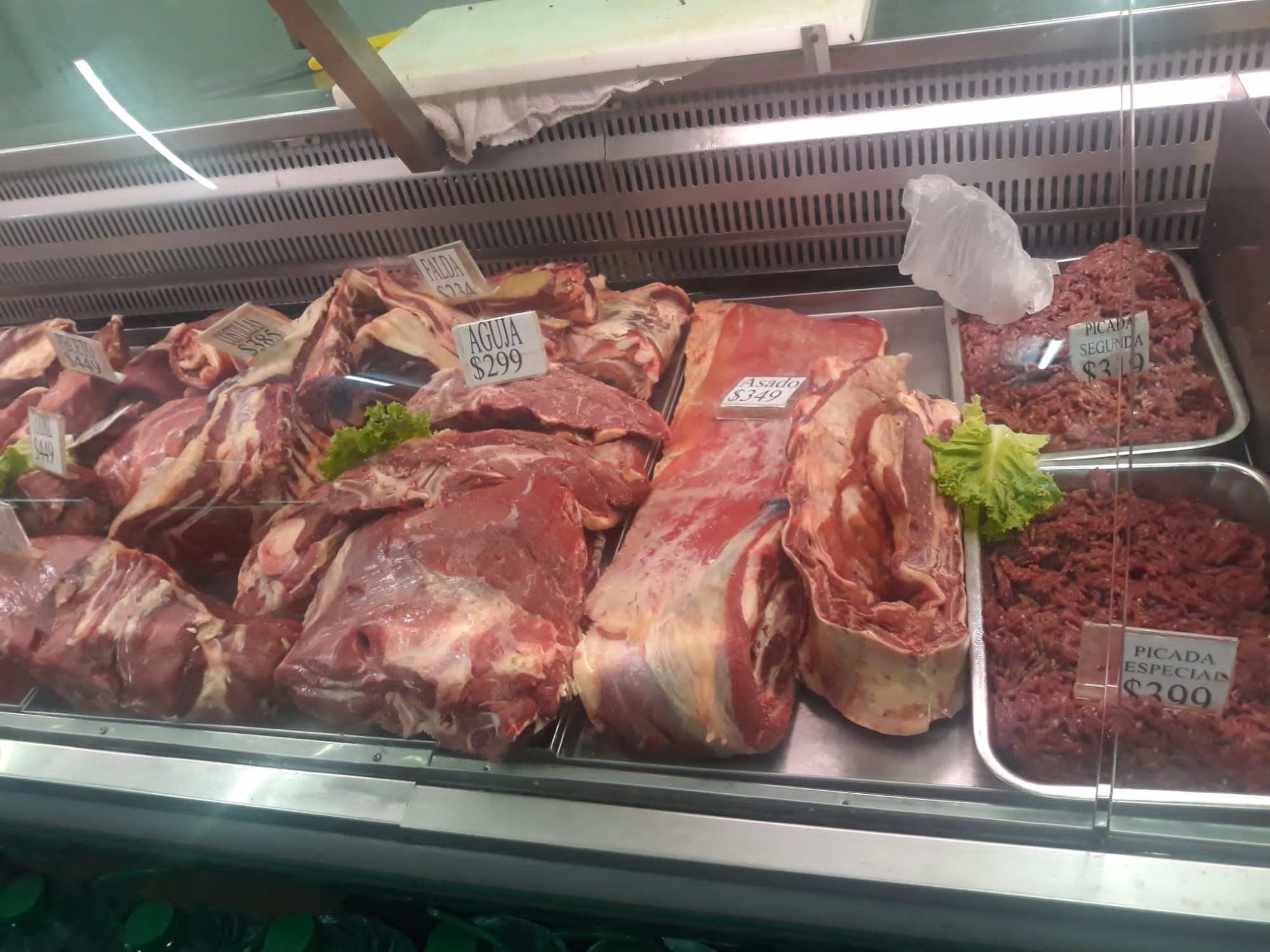 MINI MERCADO ALVARIZA Carne picada, Asado de tira, Colita de cuadril 